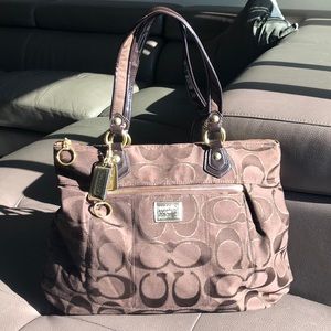 COACH. SOLD